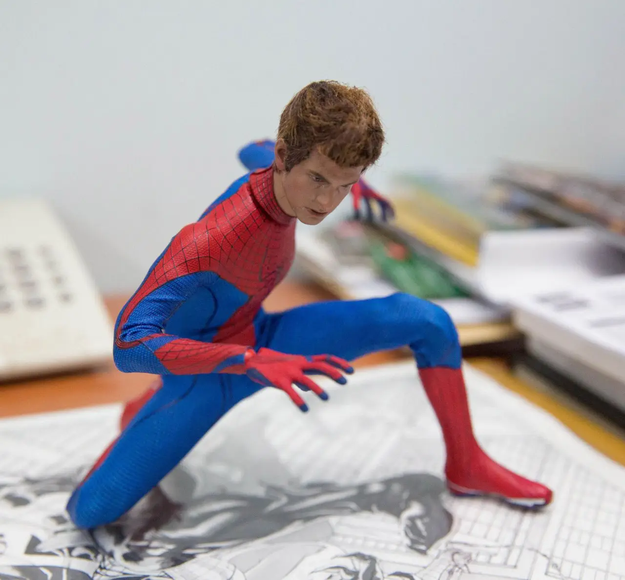 Il met en scène 90 photos de figurines Avengers X-Men Batman et Spider-Man #88