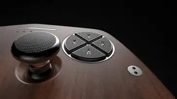 Une magnifique manette en bois de noyer et aluminium pour Xbox et Playstation